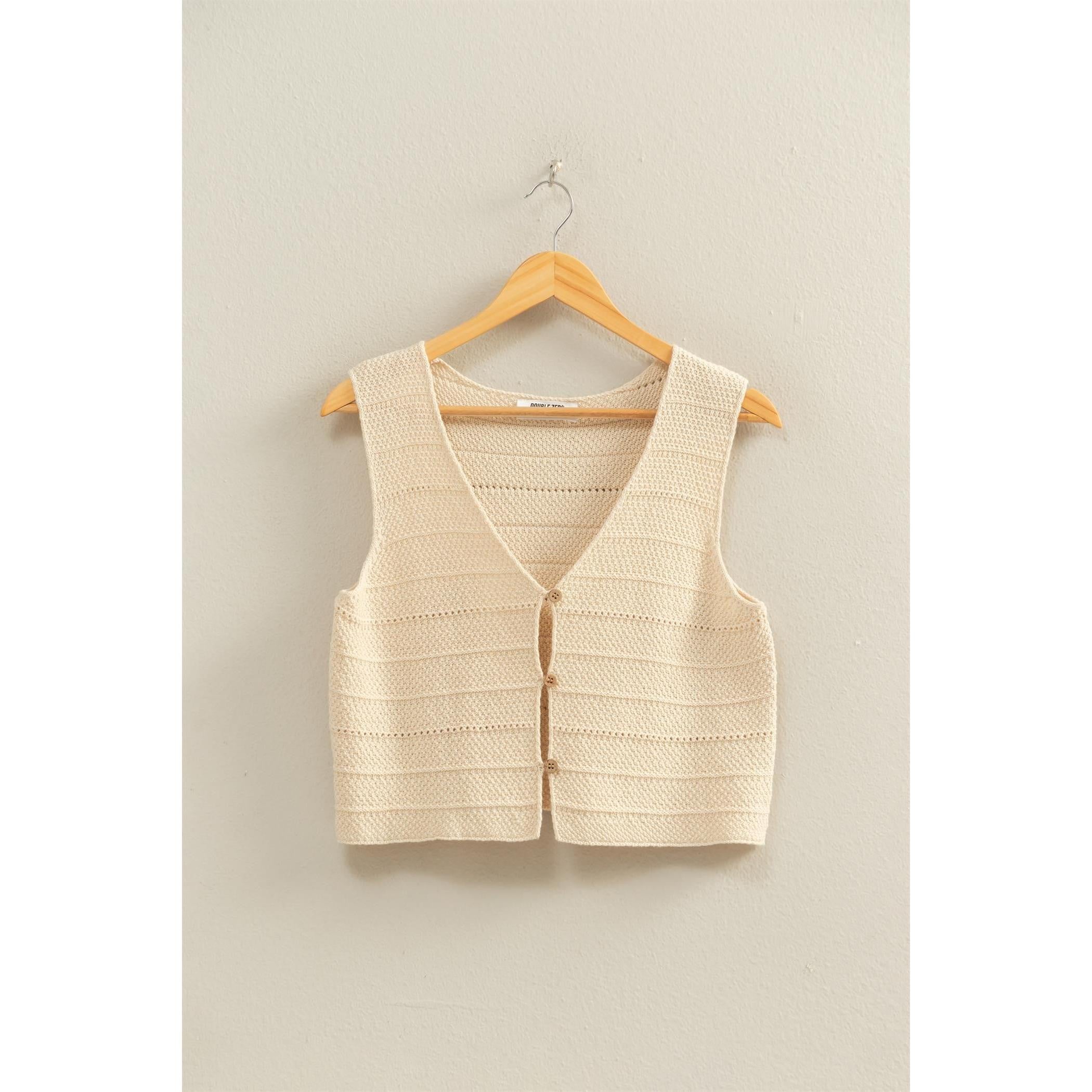cream sweater vest
